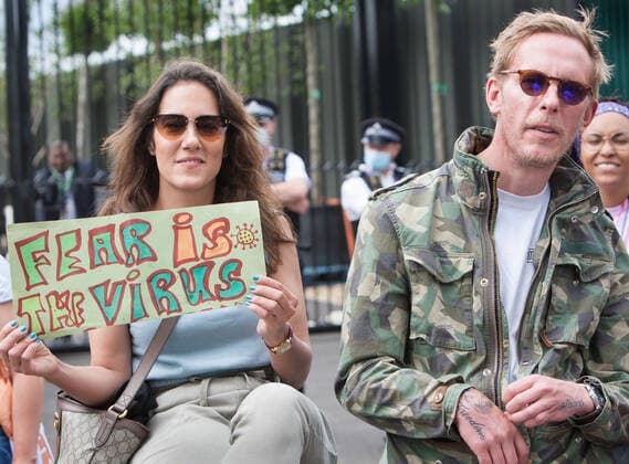 July 11, 2021, London, United Kingdom: Laurence Fox holds a placard expressing her opinion outside Centre Court during the demonstration..Demonstrators protest outside Wimbledon tennis tournament on Men s Finals Day as they call for freedom of choice, medical freedom with no Covid checks necessary to gain access to major sporting events and no vaccine passports. London United Kingdom - ZUMAs197 20210711_zaa_s197_141 Copyright: xMartinxPopex