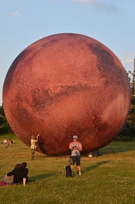 A giant inflatable model of the planet Mars is exhibited by the Brno Observatory and Planetarium on the Cow Mountain in Brno, Czech Republic, on July 12, 2021. (CTKxPhoto IgorxZehl) CTKPhotoP2021071208837  zeh