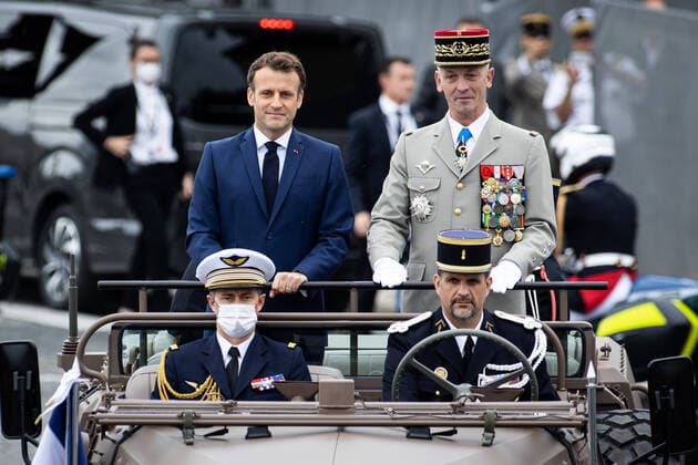Bilder des Jahres 2021, News 07 Juli News Themen der Woche KW28 News Bilder des Tages Paris, France, July 14, 2021 - French President Emmanuel Macron and French Armies Chief of Staff General Francois Lecointre stand in the command car as they review the troops during the annual Bastille Day military parade on the Champs Elysees avenue.  Copyright: xAlexisxSciardx