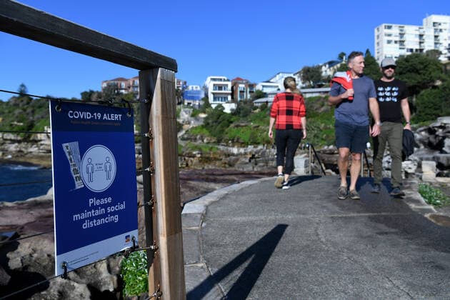 NSW CORONAVIRUS COVID19, A social distancing sits on the fence along the waling path at Bondi Beach in Sydney, Thursday, July 15, 2021. New South Wales has recorded 65 new locally transmitted coronavirus cases overnight, 28 of which were infectious during their time in the community. ( NO ARCHIVING, EDITORIAL USE ONLY, NO USE IN BOOKS WITHOUT CONSENT SYDNEY NSW AUSTRALIA  Copyright: xBIANCAxDExMARCHIx 20210715001557396307