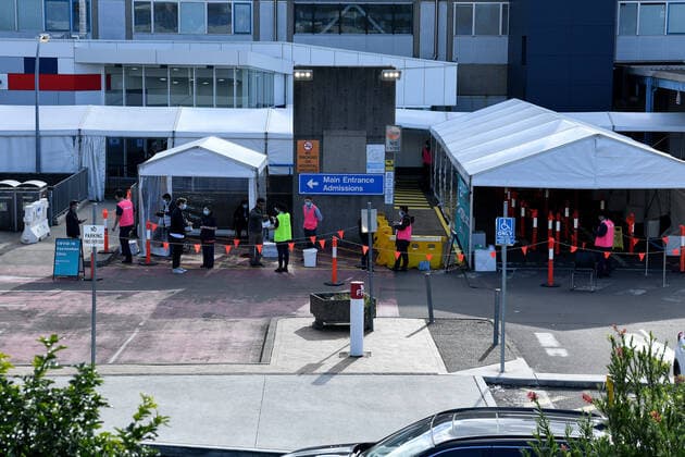 NSW CORONAVIRUS COVID19, Health workers dress in Personal Protection Equipment (PPE) speak to patients as they line up at the Westmead Hospital COVID-19 vaccination centre in Sydney, Thursday, July 15, 2021. A fully vaccinated nurse, who works at the hospitals COVID-19 ward, returned a positive test on Tuesday, despite wearing full protective equipment whist at work. ( NO ARCHIVING, EDITORIAL USE ONLY, NO USE IN BOOKS WITHOUT CONSENT SYDNEY NSW AUSTRALIA  Copyright: xBIANCAxDExMARCHIx 20210715001557408743