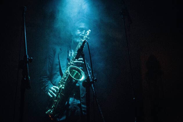 Bohren & der Club of Gore Musician and saxophonist Christoph Cl?ser from the German jazz band Bohren & der Club of Gore pictured in a light beam at a concert at Off Festival in Poland. 2013. Katowice Poland  Copyright: xGonzalesxPhoto MalthexIvarssonx