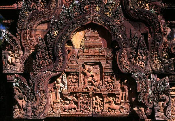 Banteay Srei (or Banteay Srey) is a 10th century Cambodian temple dedicated to the Hindu god Shiva and is located to the north-east of the main group of temples at Angkor. Banteay Srei is built largely of red sandstone, a medium that lends itself to the elaborate decorative wall carvings which are still observable today. Banteay Srei is sometimes referred to as the jewel of Khmer art. Cambodia: Krishna killing Kamsa on the west pediment of the north library building, Banteay Srei (Citadel of the Women), near Angkor xCPAxMediaxCo.xLtd.x Copyright: xDavidxHenleyx