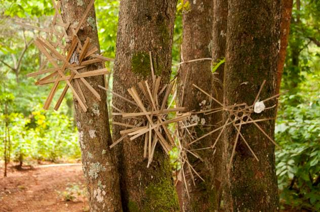 IMAGO Cultures of the world, Akha Volk in Laos Taleo, an open bamboo symbol, used by many different ethnic groups in northern Thailand and Laos as a protection against evil spirits. Here they are used to protect the trees from logging.<br ><br > The Akha are a hill tribe of subsistence farmers known for their artistry. The ethnic group may have originated in Mongolia around 1500 years ago. Most of the remaining Akha people are now distributed in small villages among the mountains of China, Laos, Myanmar (Burma), and northern Thailand, where they are one of the six main hill tribes. The Akha began arriving in Thailand in the early 20th century and continue to immigrate, with some 80,000 now living in Thailand s northern provinces of Chiang Rai and Chiang Mai at high altitudes. They spea xCPAxMediaxCo.xLtd.x Copyright: xDavidxHenleyx