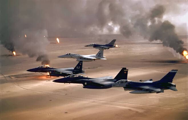 USAF aircraft of the 4th Fighter Wing (F-16, F-15C and F-15E) fly over Kuwaiti oil fires, set by the retreating Iraqi army during Operation Desert Storm in 1991.<br ><br > The Persian Gulf War (August 2, 1990 February 28, 1991), commonly referred to as simply the Gulf War, was a war waged by a U.N.-authorized coalition force from thirty-four nations led by the United States, against Iraq in response to Iraq s invasion and annexation of the State of Kuwait.<br ><br > This war is commonly known as Operation Desert Storm, the First Gulf War, Gulf War I, or the Iraq War. Kuwait USA: USAF aircraft overfly Kuwaiti oil fires, Operation Desert Storm, 1991 xSupplier:xCPAxMediaxCo.xLtd.x Copyright: xx