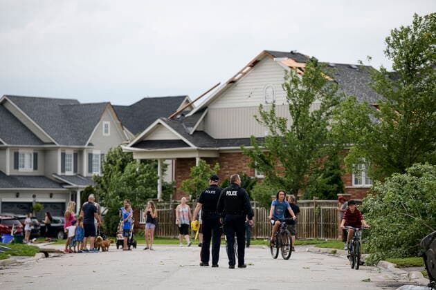 July 15, 2021, Barrie, on, Canada: Police examine a neighbourhood after a tornado touched down, in Barrie, Ont., on Thursday, July 15, 2021. Barrie Canada  - ZUMAc35_ 20210715_zaf_c35_081 Copyright: xChristopherxKatsarovx
