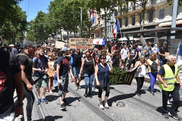 July 17, 2021, Marseille, France: Protesters march on streets holding placards and chanting slogans during the demonstration against the health pass in Marseille..More than 4,000 people in Marseille demonstrated against a health pass that French President Emmanuel Macron announced among the new anti-Covid 19 measures which will be necessary to be frequenting cafÃ terraces, restaurants, cinemas, theatres and other culture and leisure activities to help contain the spread of the Covid-19 virus. Marseille France - ZUMAs197 20210717_zaa_s197_448 Copyright: xGerardxBottinox