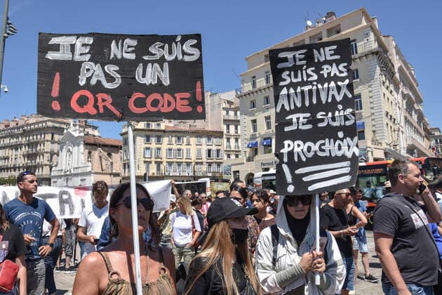 July 17, 2021, Marseille, France: Protesters hold placards during the demonstration against the health pass in Marseille..More than 4,000 people in Marseille demonstrated against a health pass that French President Emmanuel Macron announced among the new anti-Covid 19 measures which will be necessary to be frequenting cafÃ terraces, restaurants, cinemas, theatres and other culture and leisure activities to help contain the spread of the Covid-19 virus. Marseille France - ZUMAs197 20210717_zaa_s197_449 Copyright: xGerardxBottinox