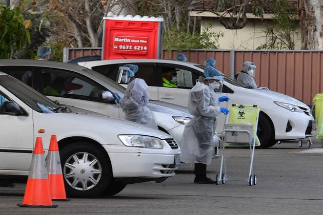 NSW CORONAVIRUS COVID19, Members of the public and health workers at a pop up Covid testing clinic at Fairfield in Sydney, Monday, July 19, 2021. NSW recorded 98 new locally acquired cases of COVID-19 in the 24 hours to 8pm last night. ( NO ARCHIVING, EDITORIAL USE ONLY, NO USE IN BOOKS WITHOUT CONSENT SYDNEY NSW AUSTRALIA  Copyright: xMICKxTSIKASx 20210719001558410765