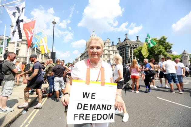 July 19, 2021, London, England, United Kingdom: Anti-lockdown and anti-vaccine protesters stage a demonstration in central London. Almost all coronavirus restrictions including social distancing and mask wearing are lifted in England from today onwards. The final stage of lockdown lifting acmes as countryÃ¢â‚¬â ¢s Health Secretary Sajid Javid tested positive for coronavirus and Prime Minister Boris Johnson and Chancellor RIshi Sunak pinged by NHS app and. Started self-isolation. London United Kingdom - ZUMAs262 20210719_zip_s262_086 Copyright: xTayfunxSalcix