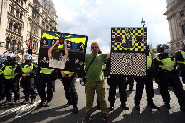 July 19, 2021, London, England, United Kingdom: Anti-lockdown and anti-vaccine protesters stage a demonstration in central London. Almost all coronavirus restrictions including social distancing and mask wearing are lifted in England from today onwards. The final stage of lockdown lifting acmes as countryÃ¢â‚¬â ¢s Health Secretary Sajid Javid tested positive for coronavirus and Prime Minister Boris Johnson and Chancellor RIshi Sunak pinged by NHS app and. Started self-isolation. London United Kingdom - ZUMAs262 20210719_zip_s262_101 Copyright: xTayfunxSalcix