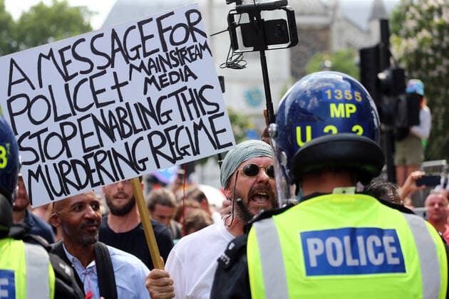 July 19, 2021, London, England, United Kingdom: Anti-lockdown and anti-vaccine protesters stage a demonstration in central London. Almost all coronavirus restrictions including social distancing and mask wearing are lifted in England from today onwards. The final stage of lockdown lifting acmes as countryÃ¢â‚¬â ¢s Health Secretary Sajid Javid tested positive for coronavirus and Prime Minister Boris Johnson and Chancellor RIshi Sunak pinged by NHS app and. Started self-isolation. London United Kingdom - ZUMAs262 20210719_zip_s262_127 Copyright: xTayfunxSalcix