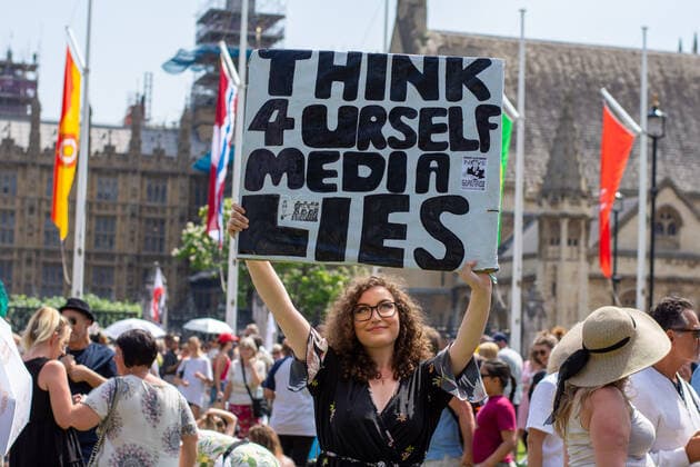 July 19, 2021, London, United Kingdom: A protester holds a placard expressing her opinion during the demonstration..Thousands of people gathered near Parliament Square in a protest against health passports, protective masks, Covid-19 vaccines and lockdown restrictions. London United Kingdom - ZUMAs197 20210719_zaa_s197_053 Copyright: xPietroxRecchiax
