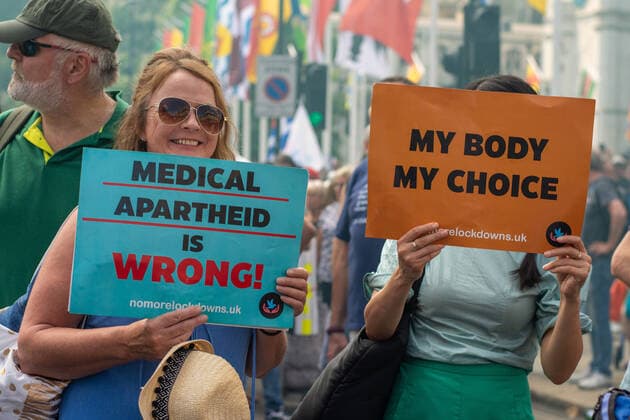 July 19, 2021, London, United Kingdom: Protesters hold placards expressing their opinions during the demonstration..Thousands of people gathered near Parliament Square in a protest against health passports, protective masks, Covid-19 vaccines and lockdown restrictions. London United Kingdom - ZUMAs197 20210719_zaa_s197_059 Copyright: xPietroxRecchiax