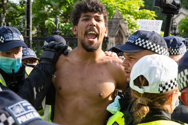 July 19, 2021, London, United Kingdom: A protester is arrested after clashing with police during an anti-vaccination protest..Anti-vaccination and anti-Covid restrictions demonstrators march to Parliament Square. They say the coronavirus pandemic is a hoax and protest against the idea of vaccine passports. London United Kingdom - ZUMAs197 20210719_zaa_s197_257 Copyright: xThaboxJaiyesimix