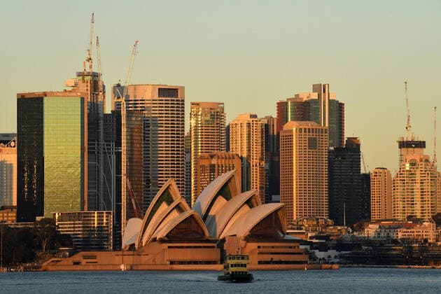 NSW CORONAVIRUS COVID19, The Sydney Opera House and city skyline is seen at dawn in Sydney, Thursday, July 22, 2021. The stay-at-home orders for coronavirus-hit Greater Sydney and surrounds have been tightened with non-essential retail to close and all construction paused until July 30. ( NO ARCHIVING, EDITORIAL USE ONLY, NO USE IN BOOKS WITHOUT CONSENT SYDNEY NSW AUSTRALIA  Copyright: xMICKxTSIKASx 20210722001559008008