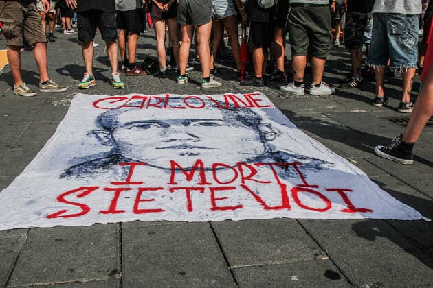 July 22, 2021, London, England, United Kingdom: This year s G20 Ministerial Meeting on Environment, Climate and Energy in Naples falls on the twentieth of anniversary Genova G8 acts of violence and abuses. The associations, movements and charities taking part in the Bees Against G20 march remember Carlo Giuliani s death with flags and choirs. London United Kingdom - ZUMAm203 20210722_zip_m203_052 Copyright: xSabrinaxMerollax