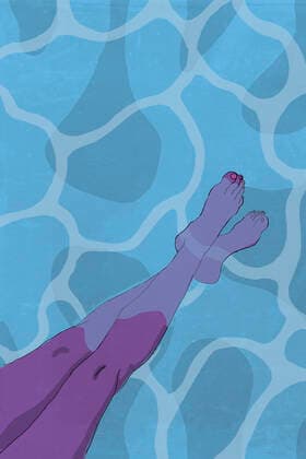 Legs of woman dipping feet in water GCAF00143