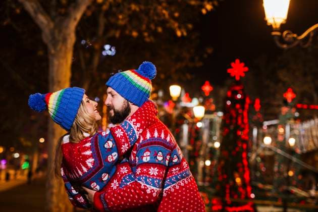 Couple doing romance during Christmas at night model released Symbolfoto LJF02182