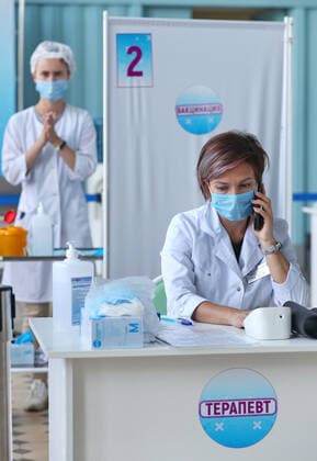 IVANOVO, RUSSIA - JULY 27, 2021: Medical workers are seen at a mobile COVID-19 vaccination center at a railway station. Vladimir Smirnov TASS  TS109CC6