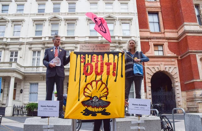 July 31, 2021, London, United Kingdom: Demonstrators hold a Shell Out! banner outside the Science Museum during the anti-Shell sponsorship protest..Extinction Rebellion activists gathered once again outside the museum in South Kensington as part of their ongoing protest against oil giant Shell s sponsorship of the Our Future Planet climate change exhibition. London United Kingdom - ZUMAs197 20210731_zaa_s197_071 Copyright: xVukxValcicx