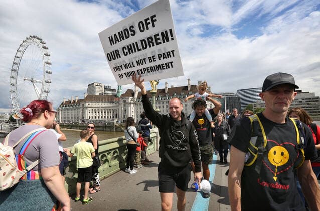 July 31, 2021, London, United Kingdom: A protester holds a placard during the demonstration..Children and their parents protest in Central London against continued Covid-19 restrictions and vaccination of children. London United Kingdom - ZUMAs197 20210731_zaa_s197_261 Copyright: xMartinxPopex