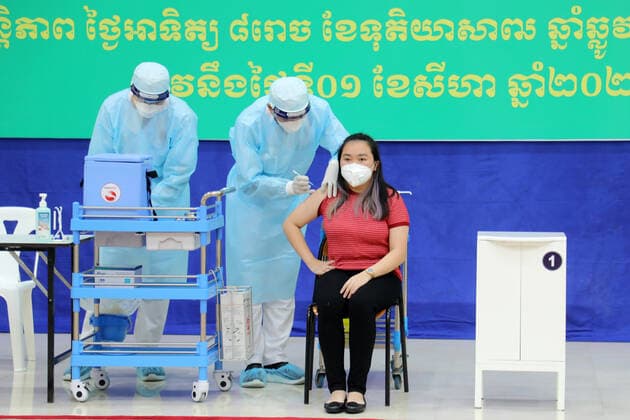 (210801) -- PHNOM PENH, Aug. 1, 2021 -- An adolescent receives her first dose of Sinovac COVID-19 vaccine in Phnom Penh, Cambodia, Aug. 1, 2021. Cambodia on Sunday launched an anti-COVID-19 vaccination drive for adolescents aged from 12 to 17, with China s Sinovac vaccine. (Photo by Xinhua) CAMBODIA-PHNOM PENH-COVID-19-VACCINATION-ADOLESCENTS LyxLay 