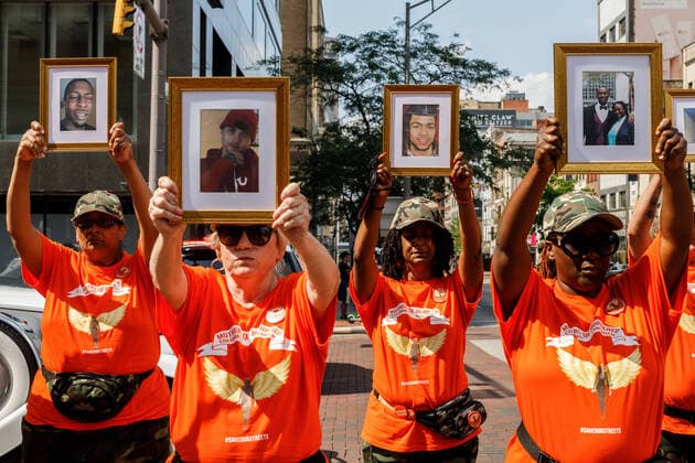 Bilder des Jahres 2021, News 08 August News Themen der Woche KW30 News Bilder des Tages August 1, 2021, Columbus, Ohio, United States: Mothers of Murdered Columbus Children stand at the intersection of High Street and Broad Street while holding pictures of their deceased children..In reaction to the rising violence since 2020 Malissa Thomas-St. Clair, a mother of a murdered son, Anthony Thomas-St. Clair, founded Mothers of Murdered Columbus Children (MOMCC), an anti-violence group seeking to end violent crime in Columbus, Ohio. MOMCC led the effort for a Central Ohio Anti-Violence March & Rally at City Hall featuring many other mothers who lost children to violence, the Ceasefire initiative led by Al Edmondson and many other community and governmental leaders. The rally and March started off with many speakers, concluding a ma - ZUMAs197 20210801_zaa_s197_213 Copyright: xStephenxZennerx