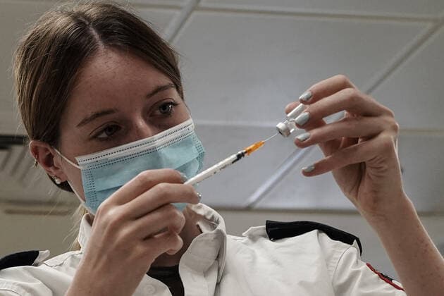 August 2, 2021, Jerusalem, Israel: Paramedics from Magen David Adom, serving as the Israeli Red Cross organization and leading EMS, deliver a 3rd BioNTech Pfizer booster vaccine to seniors at the Mishan Gonen Assisted Living Residence for the elderly. PM Bennett announced his goal of vaccinating all Israeli seniors, 60 and above, with a 3rd vaccine by the end of August 2021, in spite of the fact that a booster shot has not yet been approved by the US FDA. Jerusalem Israel - ZUMAa126 20210802_zap_a126_001 Copyright: xNirxAlonx