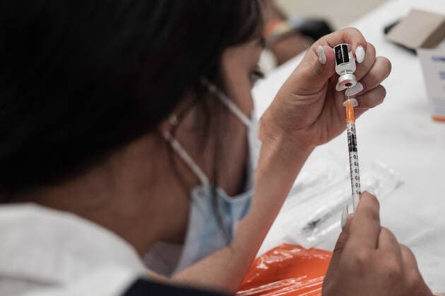 August 2, 2021, Jerusalem, Israel: Paramedics from Magen David Adom, serving as the Israeli Red Cross organization and leading EMS, deliver a 3rd BioNTech Pfizer booster vaccine to seniors at the Mishan Gonen Assisted Living Residence for the elderly. PM Bennett announced his goal of vaccinating all Israeli seniors, 60 and above, with a 3rd vaccine by the end of August 2021, in spite of the fact that a booster shot has not yet been approved by the US FDA. Jerusalem Israel - ZUMAa126 20210802_zap_a126_016 Copyright: xNirxAlonx