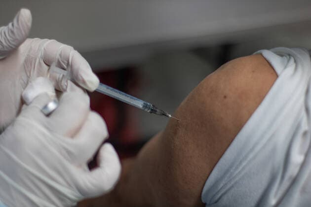 August 2, 2021, Bogota, Cundinamarca, Colombia: A women gets a dose of the Moderna COVID-19 Vaccine as public transport drivers and people from ages 25 to 30 start their vaccination phase with the Moderna novel COVID-19 vaccine against the Coronavirus disease in Bogota, Colombia on August 2, 2021. Bogota Colombia - ZUMAvp1_ 20210802_zia_vp1_038 Copyright: xXimenaxRubiox
