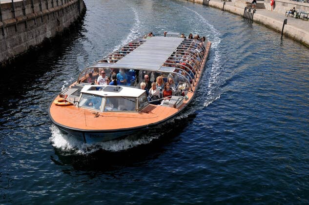 Copenhagen, Denmark., 04 August 2021,Visitors boardding on canal tour baot crusing baot in danish capital Copenhagen. (Photo..Francis Joseph Dean Dean Pictures)