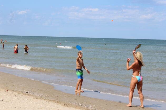 August 6, 2021, Rimini, Italy: Green pass doesn t stop Ferragosto, the Italians mid-August vacation on the beaches. In Rimini and Rivieira Romanhola region, the coast is starting to get crowded even with the green certificate being mandatory. And there are many tourists arriving in the city. Since the 6th of August, the Green Pass is mandatory in Italy. Green Pass is mandatory only to enter some closed places, such as restaurants and bars, if you intend to sit and eat at the table, but also in discos, museums, exhibitions, gyms, swimming pools, amusement parks, parties and health centers. The Government extended the mandatory green pass also for access to long-distance trains and planes.  Copyright: xJosixDonellix