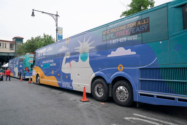 Mobile vaccination pop-up site in the Bronx Mobile vaccination pop-up site set up in the Bronx for COVID-19 vaccine available to passerby people at no cost with prepaid VISA $100 card as insensitive. City administration set up one hundred dollar insensitivity to get more people to get vaccinated amid surge of Delta variant and rise in the number of infections. The site is set by NNYC Health and Hospitals system and will remain for 3 days. They will retrun back for second dose jab on the same location in three weeks. New York New York United States Corner of West 231st street and Copyright: LevxRadin