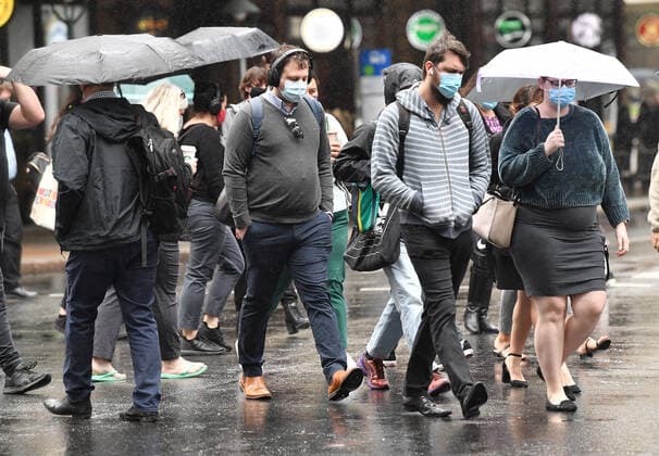 QLD CORONAVIRUS COVID19, People wearing protective face masks are seen in the CBD of Brisbane after the end of the lockdown, Monday, August 9, 2021. An eight-day lockdown has ended in Southeast Queensland after nine new COVID-19 cases were recorded in Queensland on Sunday. ( NO ARCHIVING, EDITORIAL USE ONLY, NO USE IN BOOKS WITHOUT CONSENT BRISBANE QLD AUSTRALIA  Copyright: xDARRENxENGLANDx 20210809001565672522