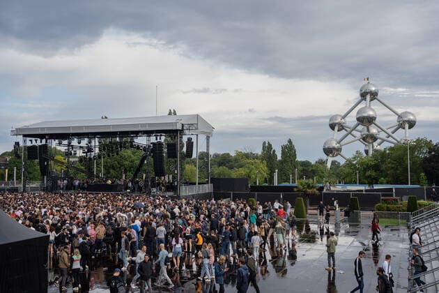 Illustration picture shows a test event with dance music that takes place at Arena 5, on the Belgium square in Brussels, opposite the Atomium at Brussels Expo, Sunday 08 August 2021. 5,000 people who have obtained a ticket and can present a Covid Safe Ticket or COVID certificate can go crazy to the music of Mooglie, Kevin De Vries, Agents of Time and Tale of Us. The event is organized by Labyrinth Large, Kompass Klub, and Hangar, in preparation for the official re-opening of events on August 13. Hangar, Labyrinth Large and Kompass Klub have built a temporary stage on the Belgiëplein where a series of events and concerts will take place until the end of September, all organized in accordance with sanitary regulations. JULIETTExBRUYNSEELS 3060000