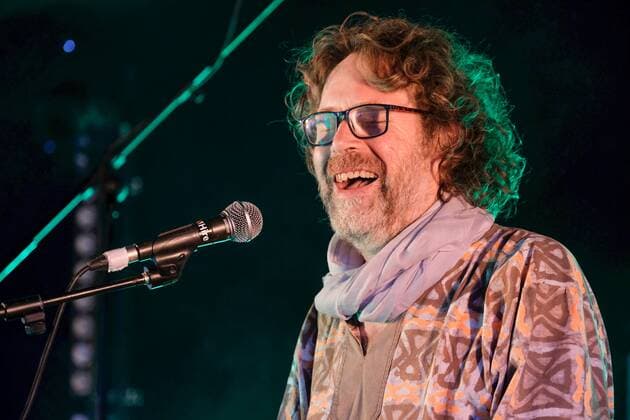August 8, 2021, Wickham, Hampshire, United Kingdom: Irish singer, songwriter, actor and musician, Liam O Maonlai best known as the lead vocalist with Dublin band The Hothouse Flowers, playing keyboard while performing live on stage at Wickham Festival. Wickham United Kingdom - ZUMAs197 20210808_zaa_s197_217 Copyright: xDawnxFletcher-Parkx