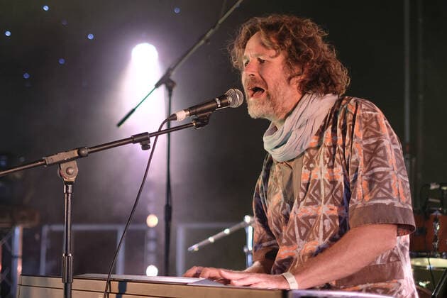 August 8, 2021, Wickham, Hampshire, United Kingdom: Irish singer, songwriter, actor and musician, Liam O Maonlai best known as the lead vocalist with Dublin band The Hothouse Flowers, playing keyboard while performing live on stage at Wickham Festival. Wickham United Kingdom - ZUMAs197 20210808_zaa_s197_228 Copyright: xDawnxFletcher-Parkx