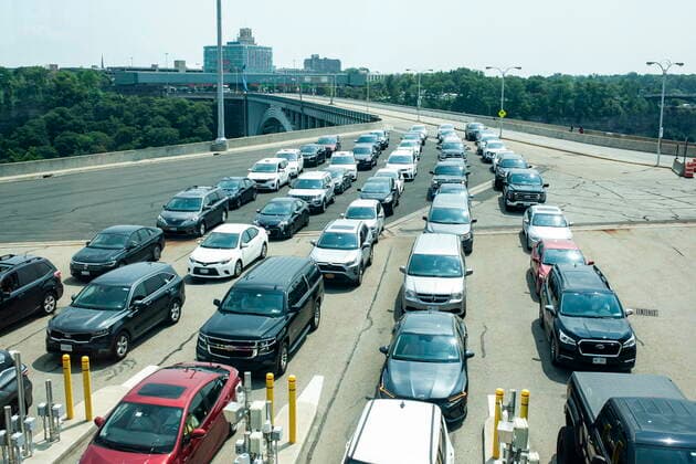 August 9, 2021, Niagara Falls, on, Canada: Cars wait on the Rainbow Bridge before crossing the border into Canada, in Niagara Falls, Ont. on Monday, August 9, 2021. American citizens and permanent residents are now allowed to enter Canada for non-essential purposes if they can provide proof that theyÃ¢â‚¬â ¢ve been fully vaccinated for at least 14 days. Niagara Falls Canada  - ZUMAc35_ 20210809_zaf_c35_065 Copyright: xEduardoxLimax