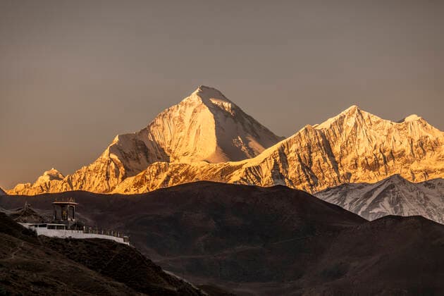 Spectacular scenery of Dhaulagiri mountain ridge lit by orange sunlight in evening in Nepal JosuTorrealday_Nepal_67.jpg Copyright: xJosuxTorrealdayx Model Released