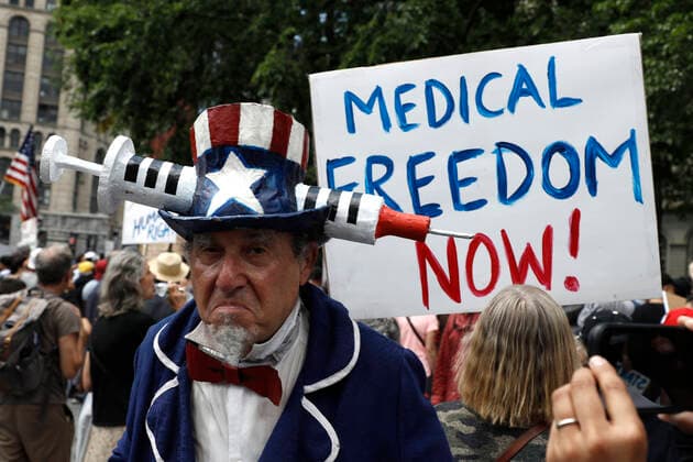 Demonstration Against Vaccine Mandates At City Hall In New York City Protesters gather in City Hall park to protest recent mandates requiring vaccines against the coronavirus on August 9,2021 in New York City, USA. Mayor Bill de Blasio announced that as of August 16th entry into indoor spaces will require a vaccination against Covid-19 with an enforced mandate on September 13th. New York State Governor Andrew Cuomo also announced that all state employees and health care workers as well as patients facing health care workers will have to be vaccinated or will have to comply with weekly testing. According to the CDC New York City is considered to be at a substantial level of transmission of the coronavirus infections. The Delta variant of Co  Copyright: xJohnxLamparskix