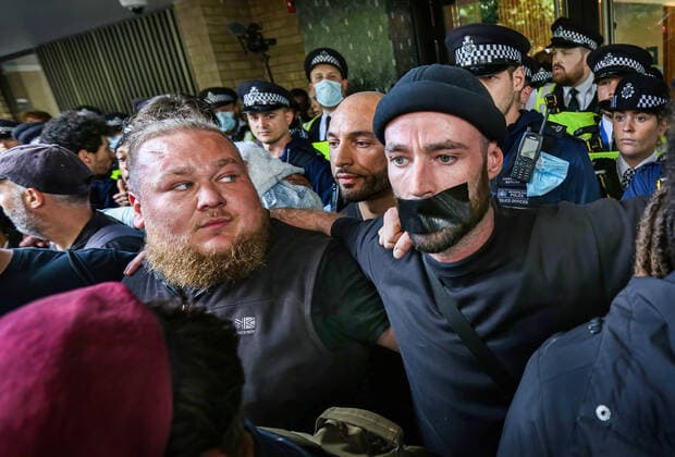 August 9, 2021, London, United Kingdom: Actor Sean Ward with a black tape over his mouth takes part during the demonstration..Protesters held a demonstration against the mainstream media bias, covid restrictions, vaccine passports, Covid vaccination for children and the loss of freedom under the Coronavirus Act. London United Kingdom - ZUMAs197 20210809_zaa_s197_125 Copyright: xMartinxPopex