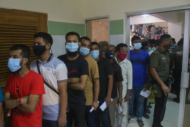 August 10, 2021: Sylhet, Bangladesh: Crowed gathered to take the Covid-19 vaccine at the M A G Osmani Medical College & Hospital vaccination center. The effects of the delta variant of coronavirus (COVID-19) are increasing the number of infections and deaths across Bangladesh. The number of patients is increasing in almost every hospital in Bangladesh. - ZUMAr143 20210810_zap_r143_005 Copyright: xMdxRafayatxHaquexKhanx