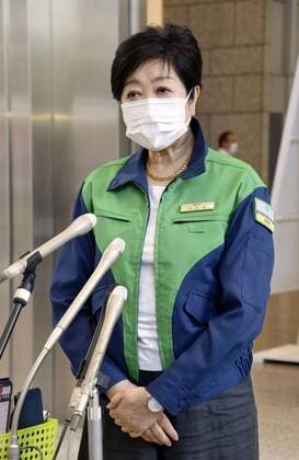 Tokyo Gov. Koike Tokyo Gov. Yuriko Koike speaks to reporters at the metropolitan government headquarters building in Tokyo on Aug. 10, 2021, wearing a mask amid the coronavirus pandemic.  A14AA0000757606P