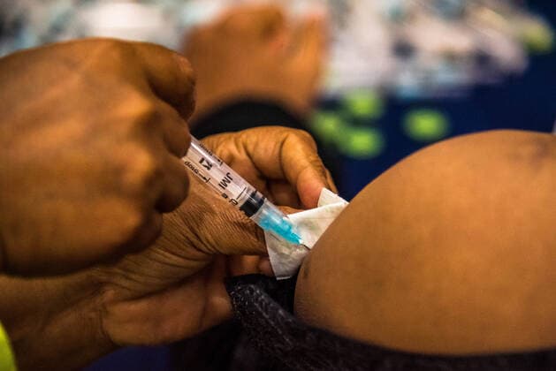 Astrazeneca 2nd Dose Vaccination Campaign In Bangladesh BARISHAL, BANGLADESH- AUGUST 10: A person receives the second dose of AstraZeneca vaccine during a health program against Covid-19, as attempt to reduce infections by coronavirus, after the positive cases are increase with the Delta variant on August 10, 2021 Barishal, Bangladesh. Copyright: xMustasinurxRahmanxAlvix EYEPIXGROUP_MRA_10082021_11838