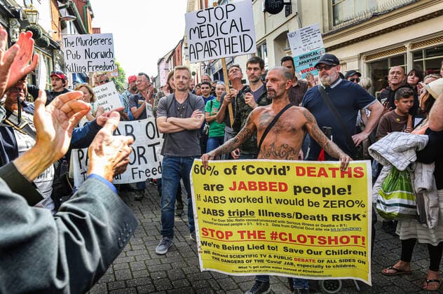 August 10, 2021, Norwich, United Kingdom: Protesters hold placards while marching on the street during the demonstration..Anti vax-passport protesters visit Norwich to highlight the discrimination they believe is taking place at The Murderers pub. The landlord Phil Cutter has introduced a new no jab, no entry rule that he says protects both his staff and customers. Norwich United Kingdom - ZUMAs197 20210810_zaa_s197_294 Copyright: xMartinxPopex
