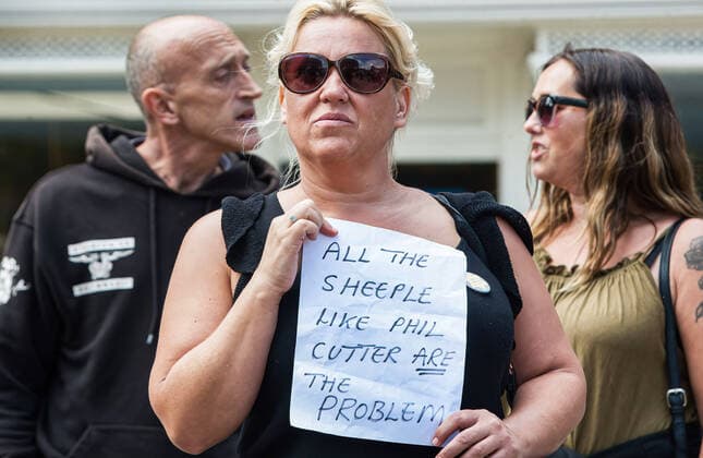 August 10, 2021, Norwich, United Kingdom: A protester holds a sign during the demonstration..Anti vax-passport protesters visit Norwich to highlight the discrimination they believe is taking place at The Murderers pub. The landlord Phil Cutter has introduced a new no jab, no entry rule that he says protects both his staff and customers. Norwich United Kingdom - ZUMAs197 20210810_zaa_s197_298 Copyright: xMartinxPopex