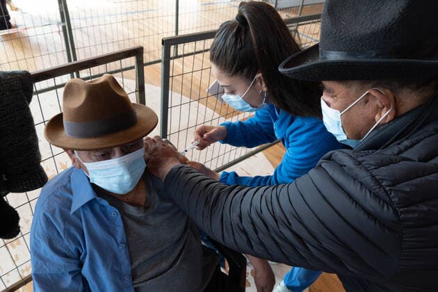August 11, 2021, Pucon, Araucania, Chile: An older adult receives the third dose of the Covid vaccine, in the municipal gym of Pucon, in southern Chile, which has been transformed into a vaccination center against Covid. Today in Chile began the vaccination of adults over 86 years of age with the third dose. This third dose is for those who have previously received the two doses of Sinovac, and this third time it is inoculated with a dose of Astrazeneca. Pucon Chile - ZUMAb332 20210811_zip_b332_017 Copyright: xMatiasxBasualdox