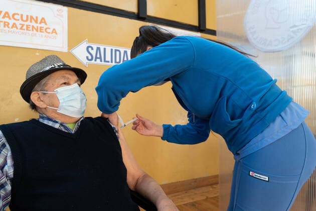 August 11, 2021, Pucon, Araucania, Chile: An older adult receives the third dose of the Covid vaccine, in the municipal gym of Pucon, in southern Chile, which has been transformed into a vaccination center against Covid. Today in Chile began the vaccination of adults over 86 years of age with the third dose. This third dose is for those who have previously received the two doses of Sinovac, and this third time it is inoculated with a dose of Astrazeneca. Pucon Chile - ZUMAb332 20210811_zip_b332_024 Copyright: xMatiasxBasualdox