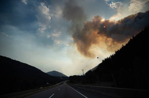 August 11, 2021, MERRITT, BC, Canada: Smoke from the July Mountain wildfire nearly blocks out the sun while burning along the Coquihalla Highway south of Merritt, B.C., on Wednesday, August 11, 2021. MERRITT Canada  - ZUMAc35_ 20210811_zaf_c35_286 Copyright: xDarrylxDyckx